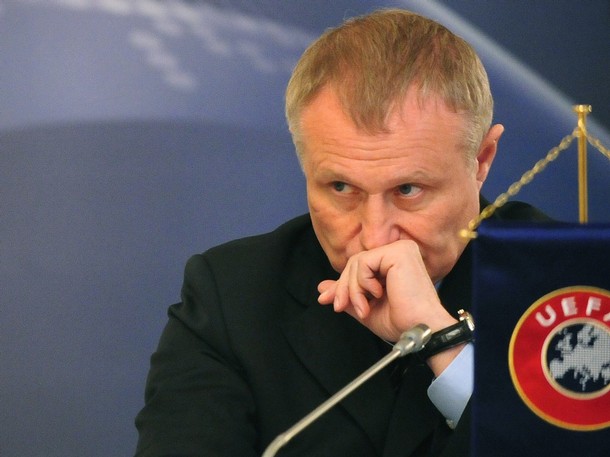 Hrigory_Surkis_behind_UEFA_logo