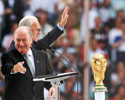 Sepp_Blatter_with_Franz_Beckenbauer_and_World_Cup