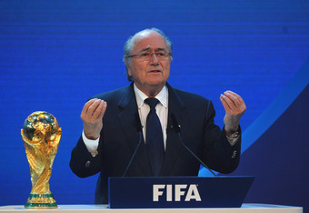 Sepp_Blatter_with_World_Cup_and_FIFA_sign