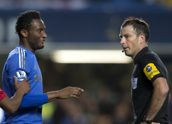 John Mikel_Obi_2nd_R_talking_with_referee_Mark_Clattenburg